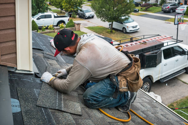 Professional Roof Replacement technician working in Fullerton, PA